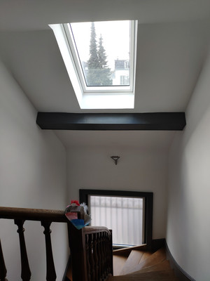 Éclairage zénithal de la cage d'escalier