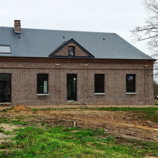 Rénovation globale d’une habitation en briques par Artech Architecture - Lucille Régnier